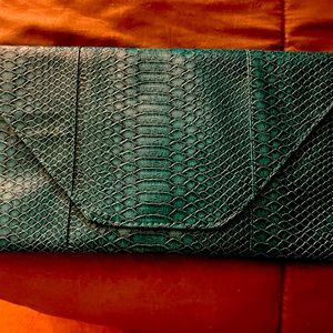 Turquoise leather handbag. Brand new never used.